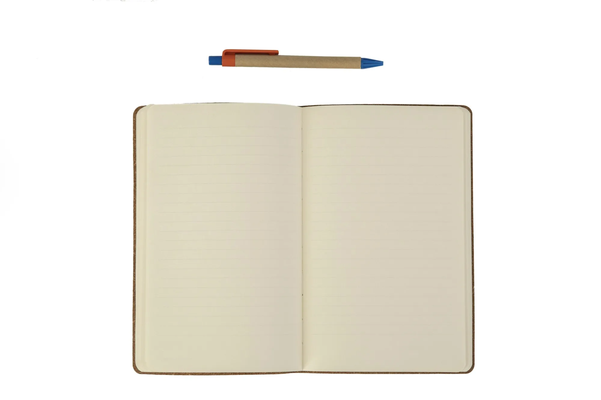 Open notebook with a pen on a white background